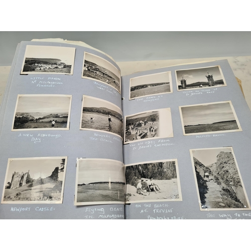 547 - Two Photograph Albums containing an extensive collection of photographs from cycling clubs trips aro... 