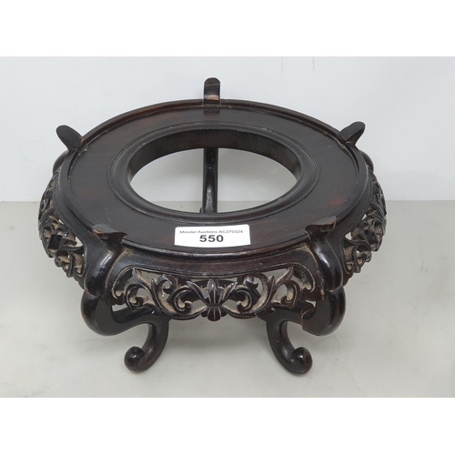 550 - A collection of twelve assorted hardwood Chinese Pot Stands some with pierced decorations and shaped... 