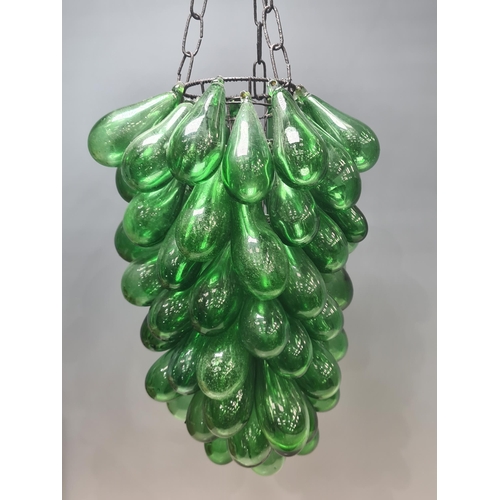 551 - A Ceiling Light Shade decorated with green glass baubles suspended from a wire frame 12in L (R6)