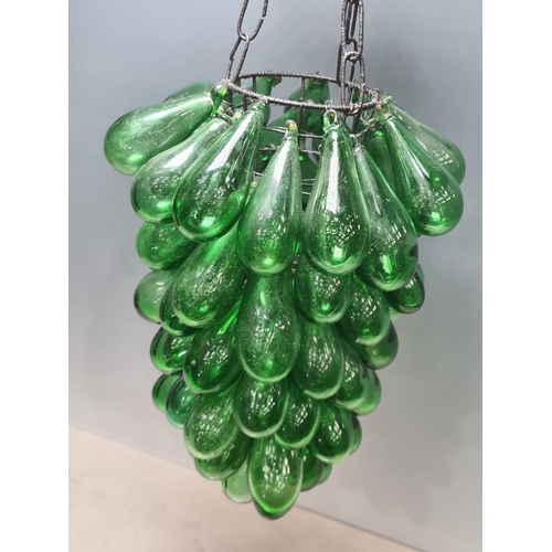 551 - A Ceiling Light Shade decorated with green glass baubles suspended from a wire frame 12in L (R6)