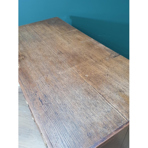 56 - A 19th Century oak Chest of two short and three long drawers on bracket feet, 3ft 4in wide