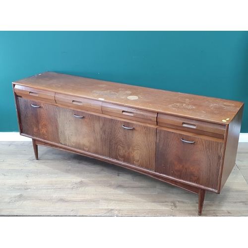 620 - A mid-Century teak Sideboard fitted four frieze drawers above four cupboard doors 6ft 1in W x 2ft 6i... 