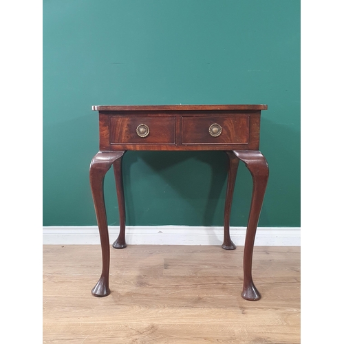 626 - A mahogany Side Table with leather inset top fitted two frieze drawers raised on cabriole supports a... 