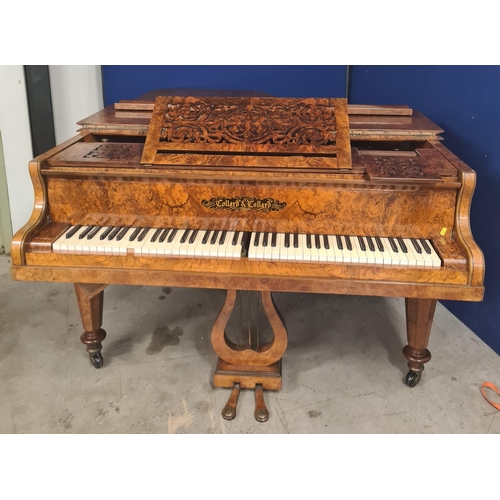 689 - An antique walnut cased baby Grand Piano by Collard & Collard raised on octagonal tapering supports ... 