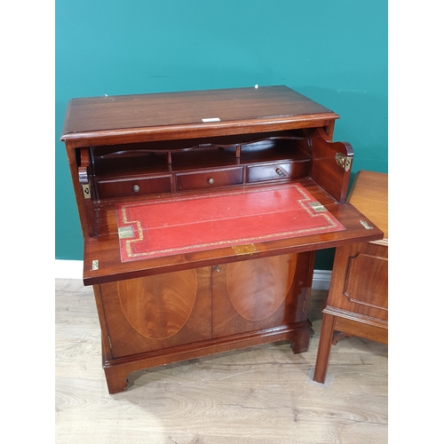 7 - A mahogany veneered Secretaire Cupboard fitted single drawer with fitted interior above pair of door... 