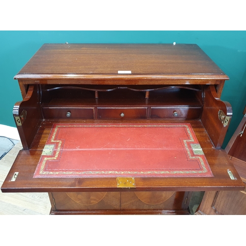 7 - A mahogany veneered Secretaire Cupboard fitted single drawer with fitted interior above pair of door... 