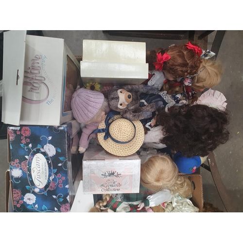 81 - Three boxes of assorted Dolls including, a boxed Tuscany Porcelain Doll, a Leonardo Collection Boxed... 