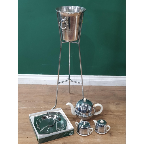 833 - A Champagne Bucket on tripod Stand, a ceramic and plated Tea Service and a silver plated Cake Tray a... 