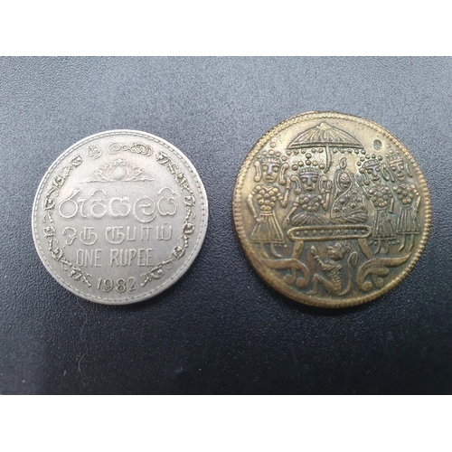 97 - A white metal combined Vesta and Sovereign Case in the form of a book, two Indian Coins, quantity of... 