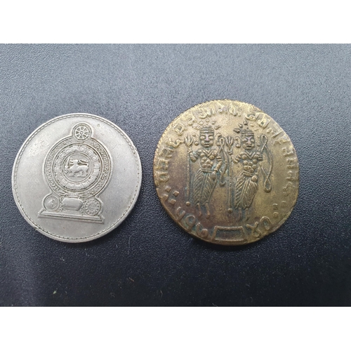 97 - A white metal combined Vesta and Sovereign Case in the form of a book, two Indian Coins, quantity of... 