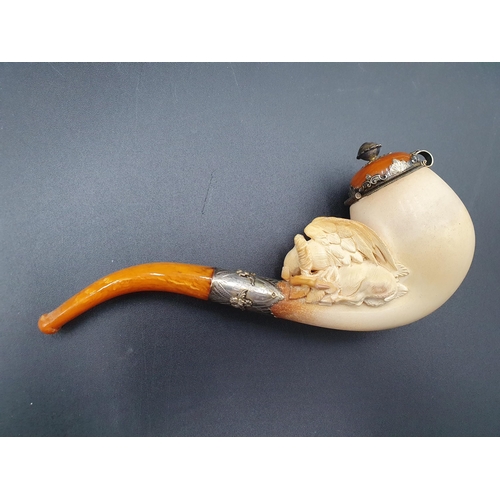 98 - A Meerschaum Pipe with bird of prey and deer, finely engraved mounts, another with female bust and f... 