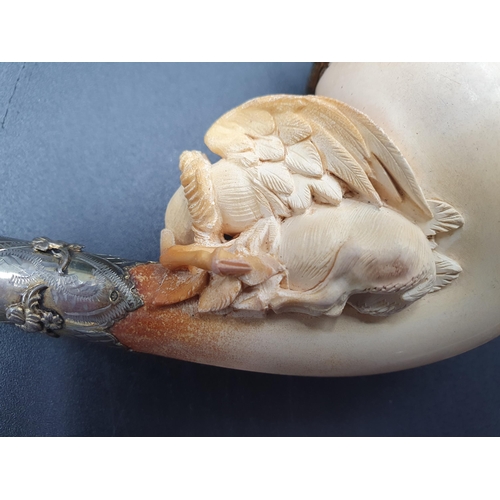 98 - A Meerschaum Pipe with bird of prey and deer, finely engraved mounts, another with female bust and f... 