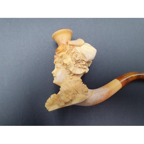 98 - A Meerschaum Pipe with bird of prey and deer, finely engraved mounts, another with female bust and f... 