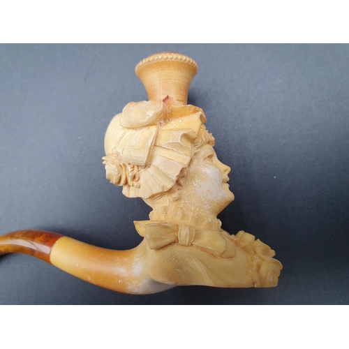 98 - A Meerschaum Pipe with bird of prey and deer, finely engraved mounts, another with female bust and f... 