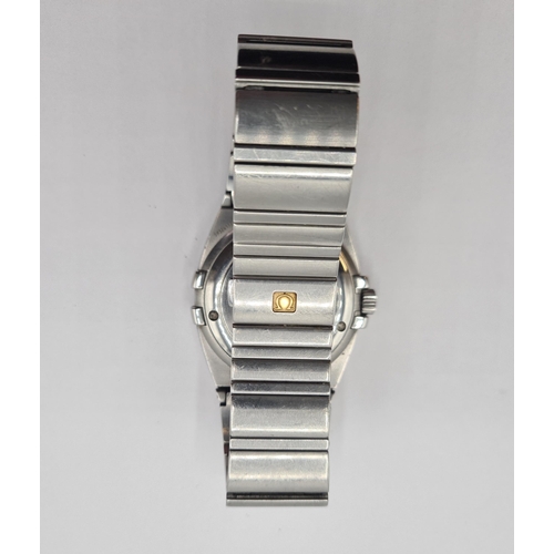 165 - A gentleman's Omega Constellation Quartz Wristwatch the brushed steel dial with hourly baton markers... 