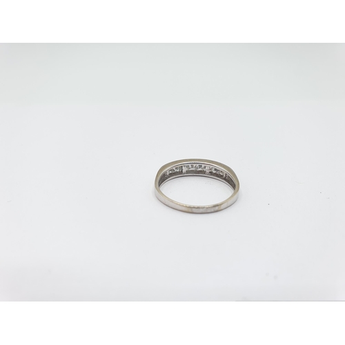 182 - A Diamond half Eternity Ring invisibly-set princess-cut stones in 18ct white gold, ring size Q, appr... 