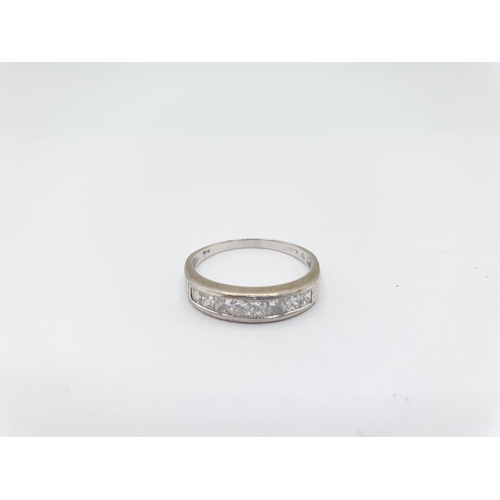 182 - A Diamond half Eternity Ring invisibly-set princess-cut stones in 18ct white gold, ring size Q, appr... 