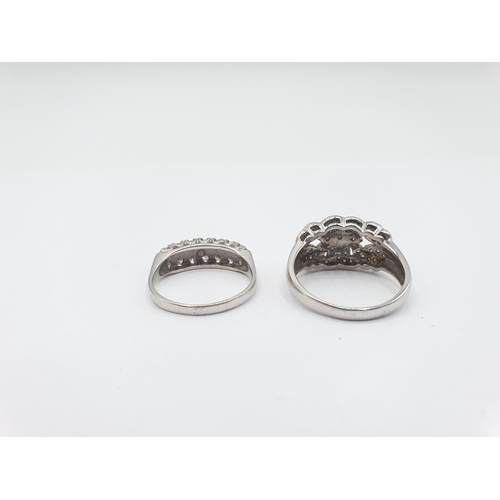 183 - A Diamond Ring the front with woven effect millegrain-set numerous eight-cut stones in 18ct white go... 