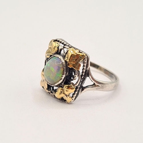 191 - A 1930's Opal Ring believed to be Sibyl Dunlop set oval opal cabochon in openwork white metal rectan... 