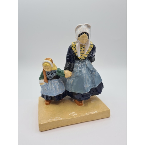 229 - A Henriot Quimper pottery Figure Group of mother and daughter, marked Henriot Quimper 136 J E Sevell... 