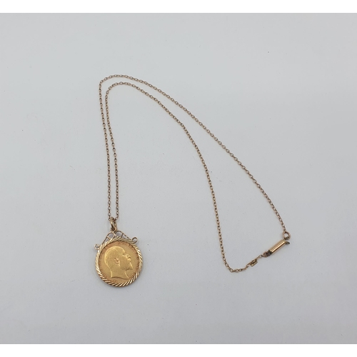 231 - An Edward VII half Sovereign 1902, in 9ct gold pendant mount on fine chain, approx 6.70gms all in