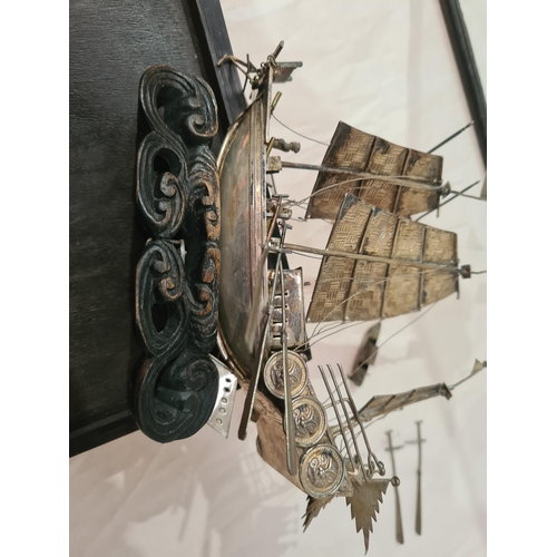 143 - A Chinese silver three masted Sailing Boat with figures and oars, and two smaller vessels, all under... 