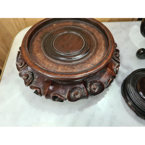 550 - A collection of twelve assorted hardwood Chinese Pot Stands some with pierced decorations and shaped... 