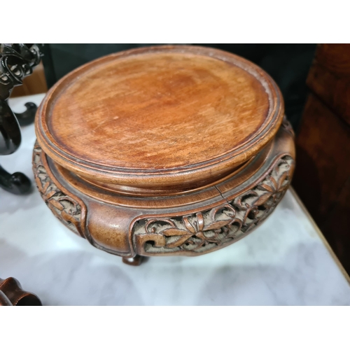 550 - A collection of twelve assorted hardwood Chinese Pot Stands some with pierced decorations and shaped... 