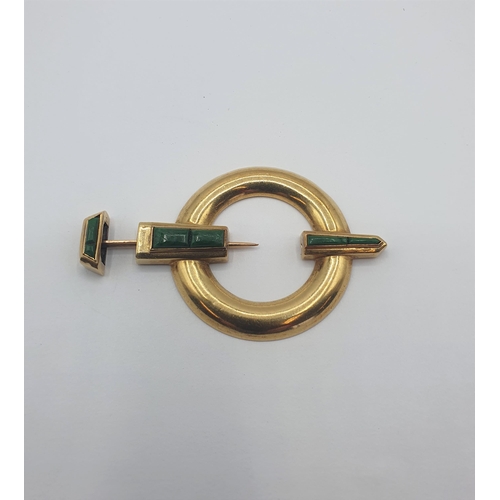 164 - A gold Penannular Brooch set green stone, approx 5.2cms wide, approx 10.90gms, unmarked, untested