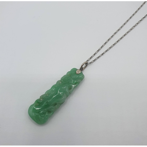 169 - A Jade Pendant carved roses on fine platinum chain, approx 40mm long