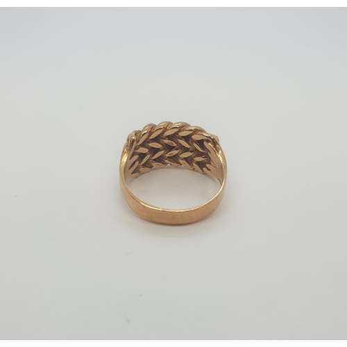 175 - A gold Keeper Ring stamped 9ct, ring size L 1/2, approx 6.70gms