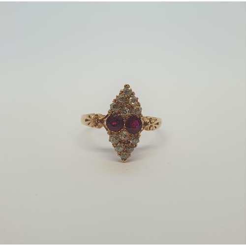 177 - An early 20th Century Ruby and Diamond Ring the marquise shaped plaque pavé-set two round rubies bet... 