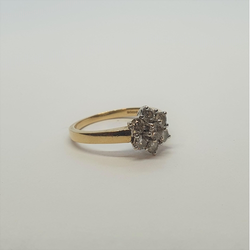 178 - A Diamond Cluster Ring claw-set seven brilliant-cut stones in 18ct gold, ring size L, approx 3.40gms