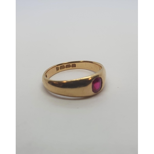 184 - An 18ct gold Ring gypsy-set synthetic ruby, ring size Q, approx 5.50gms