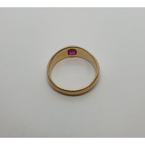 184 - An 18ct gold Ring gypsy-set synthetic ruby, ring size Q, approx 5.50gms