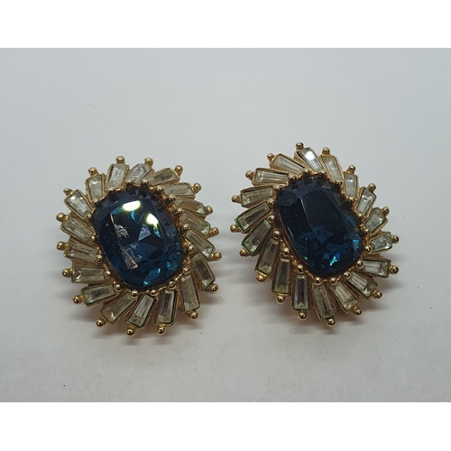 208 - A pair of Christian Dior cluster Ear Clips set blue and white paste in gilt metal, marked Chr Dior