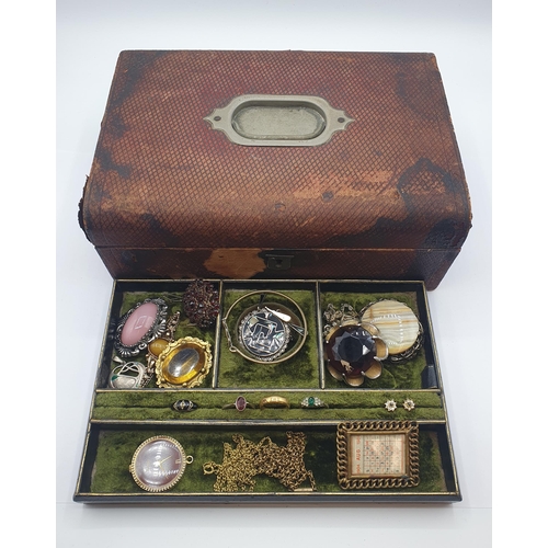 217 - A Jewel Box containing Garnet Brooch and various vintage Costume Brooches etc