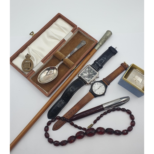 231 - A WWI South Wales Borderers Swagger Stick, a War Service Medal, a silver Napkin Ring, a silver plate... 