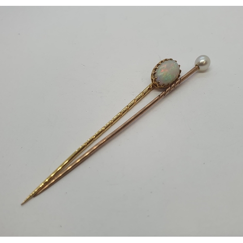 237 - An Opal Stick Pin claw-set oval cabochon and a Stick Pin with single cultured pearl finial