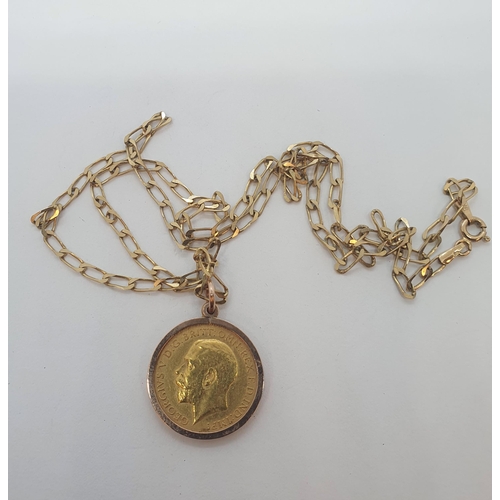 241 - A George V half Sovereign 1914 on 9ct gold flattened curb link chain, approx 8.8gms all in