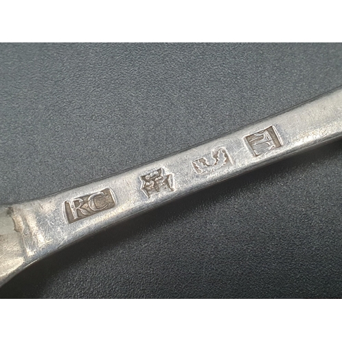 101 - A George III silver bottom marked Table Spoon Hanoverian pattern engraved initials, crest of dog and... 