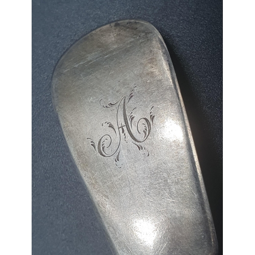 101 - A George III silver bottom marked Table Spoon Hanoverian pattern engraved initials, crest of dog and... 