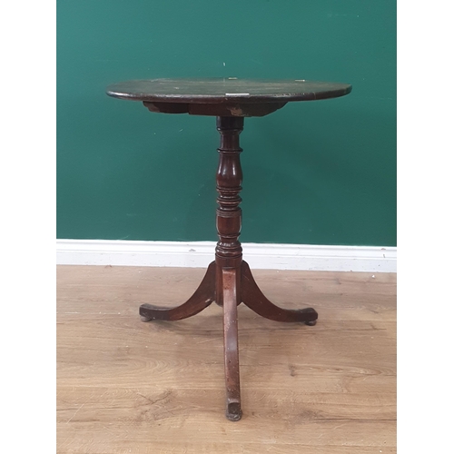 12 - An antique oak circular topped Tripod Table on turned column and splayed tripod supports. 29in High ... 