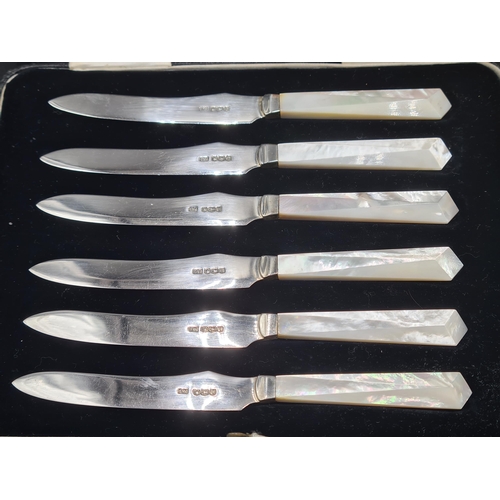 131 - Six George VI silver Coffee Spoons, Birmingham 1947, six George V Dessert Knives with silver blades ... 