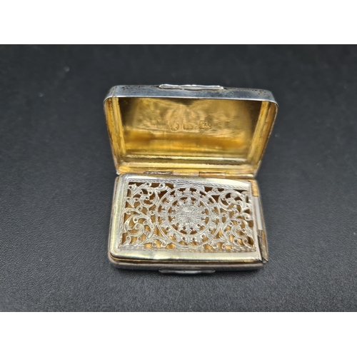 149 - A George III silver Vinaigrette with engine turning and vacant cartouche, rosette and leafage scroll... 