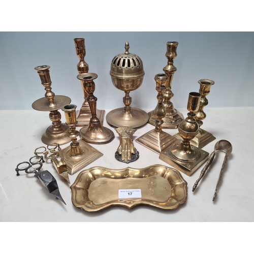 17 - A collection of Brassware including, Eight assorted Candlesticks, a Letter Clip in the form of a Han... 