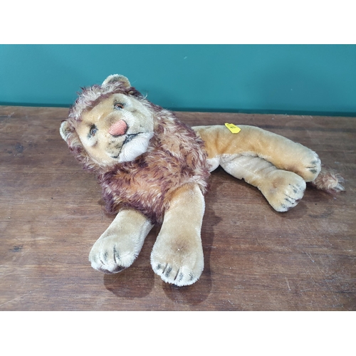 23 - A recumbent Lion Soft Toy (believed to be Steiff but unmarked), 1ft 2