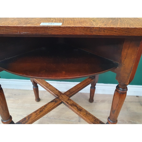 297 - An early 20th Century oak Occasional Table with square top, circular undertier, raised on baluster t... 