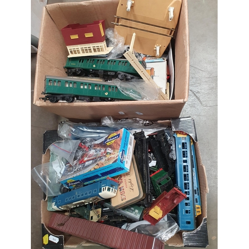 337 - Two boxes of model railway items including engines, buildings, etc (R5)