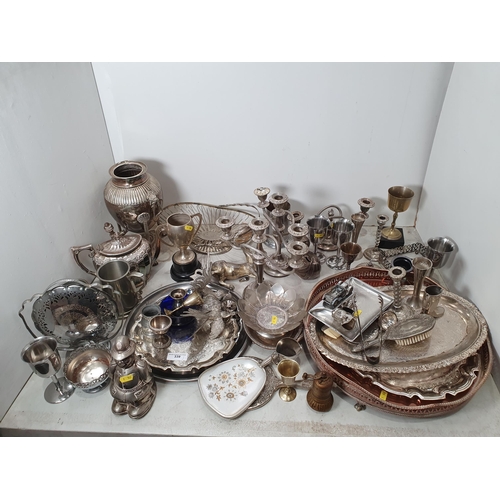 339 - A large quantity of plated items including a Teapot, large circular pierced Tray, assorted Goblets, ... 